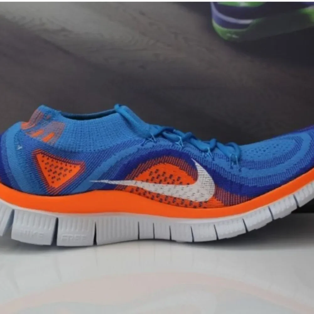 New in Box Nike Flyknit + Blue Glow Total Orange Mens 9.5 US 43 EUR RARE